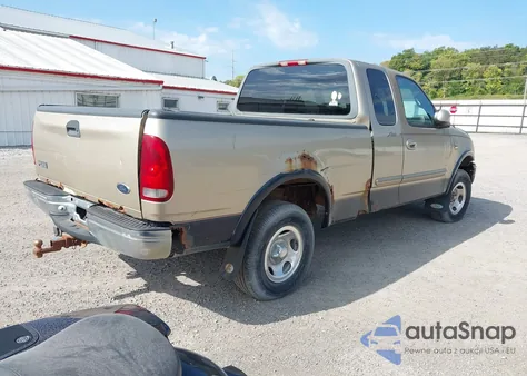 1999 Ford F-150 Lariat/Xl/Xlt из США, поврежденный, VIN 1FTRX18L7XKA04701